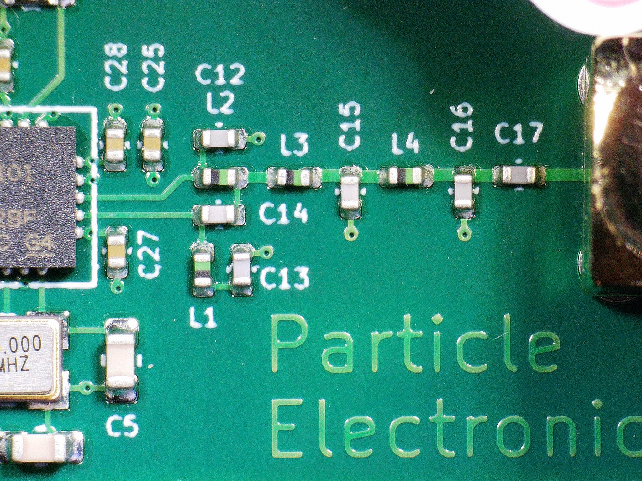 JamFinder PCB close-up showing RF filter components and Particle Electronics branding
